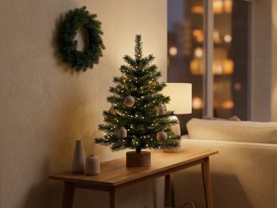 Make Small Rooms Feel Festive With Mini Trees and Wreaths
